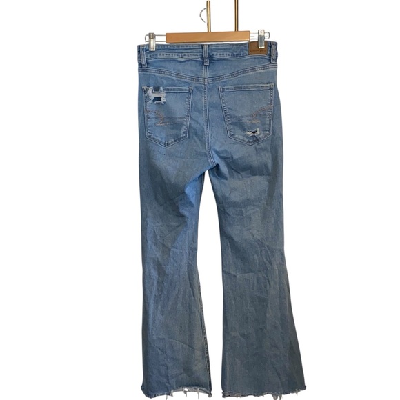 American Eagle Next Level Ripped Super High-Waisted Flare Jeans light blue - Picture 9 of 10